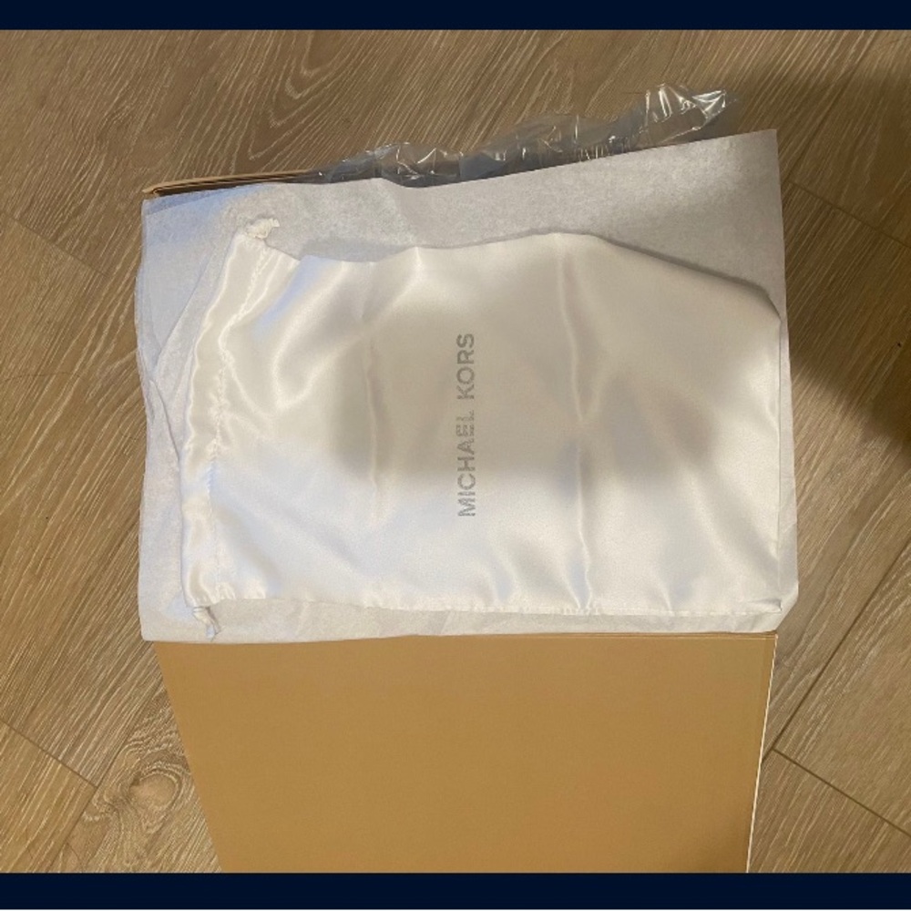 Size 9 Ballerina Michael Kors. Never worn , dust bag and tags still on items.